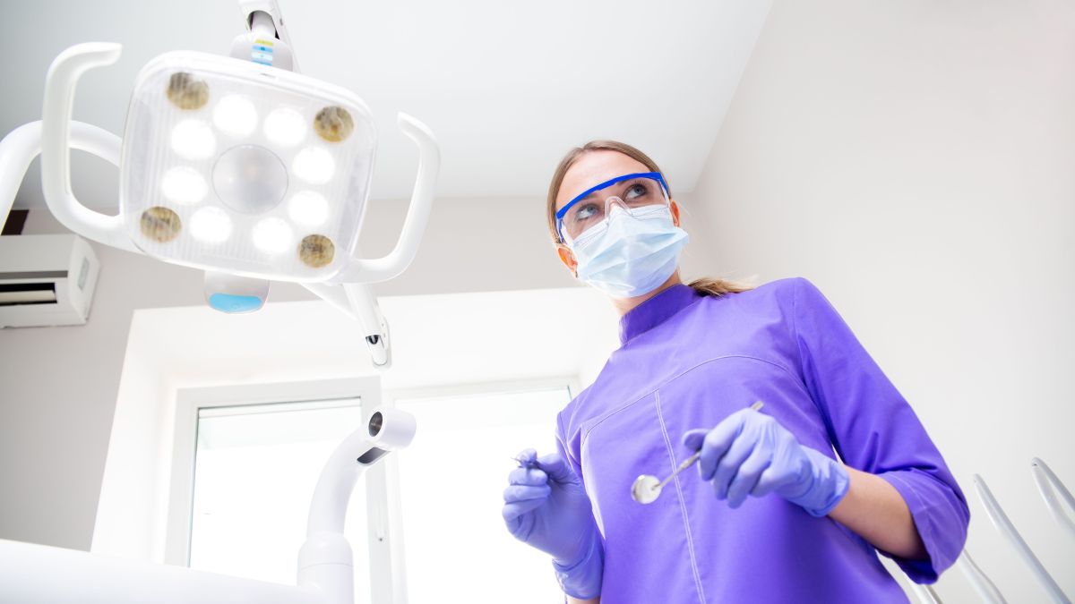 Illustration for Dentist occupation by Shada Migration Services.