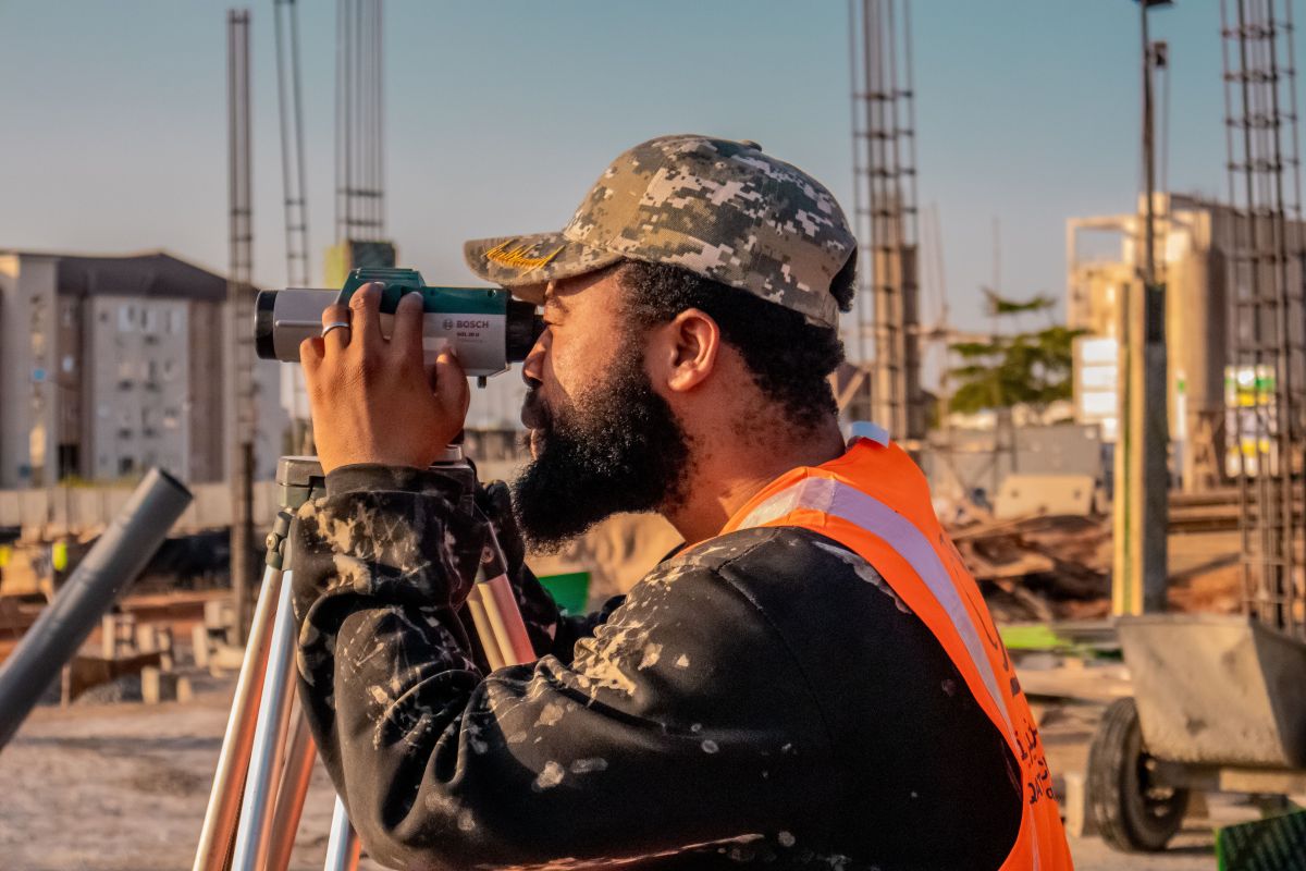 Illustration for Surveyor occupation by Shada Migration Services.