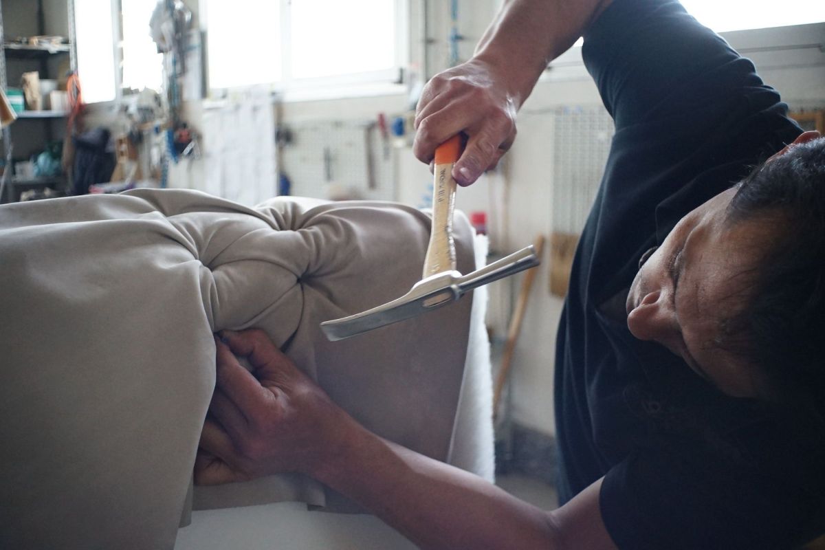 Illustration for Upholsterer occupation by Shada Migration Services.